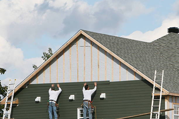 Professional Emergency Siding Repair technician working in Guilford, CT